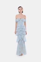 Blue lace ruffle strap-off gown by Montsand, featuring elegant lace details and a flowing silhouette.