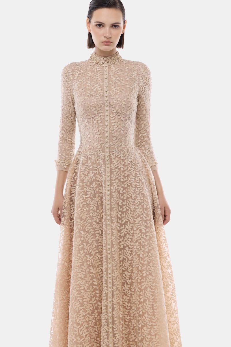 Elegant gold leaf button front gown by Montsand featuring a flowing design and intricate details.