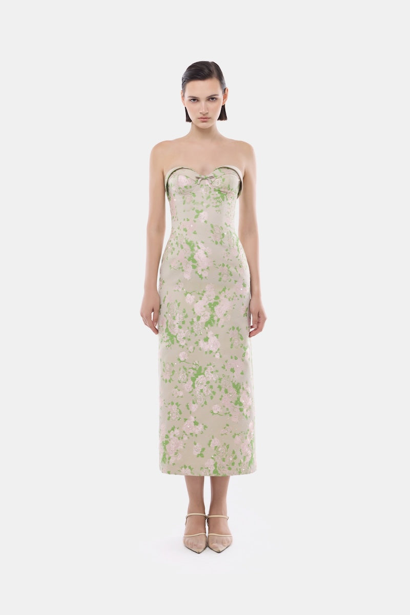 Elegant pastel floral corsetry tube dress by Montsand, featuring a fitted gown with floral print and structured design.