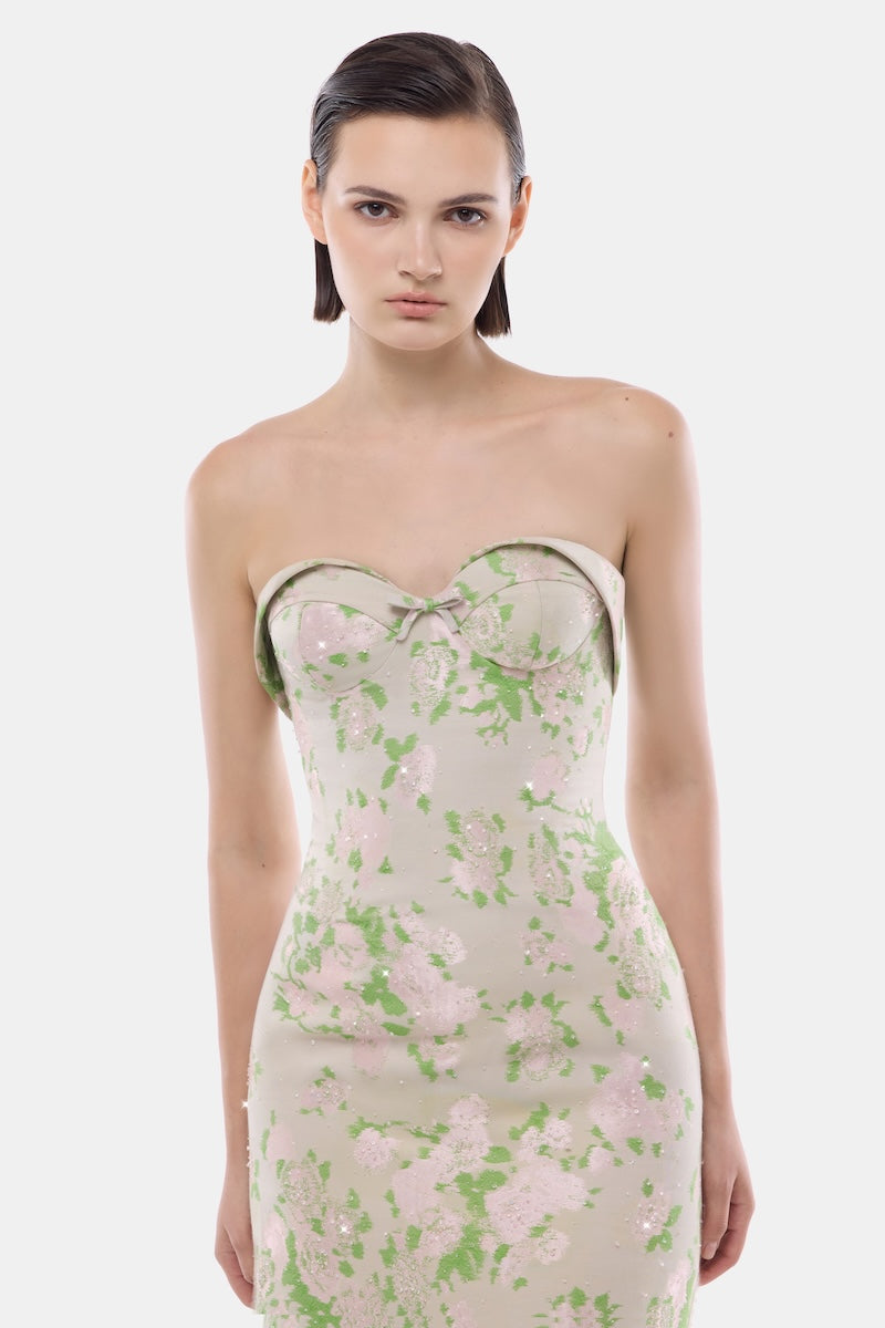 Pastel floral corsetry tube dress by Montsand, featuring a fitted gown with floral patterns and elegant design details.