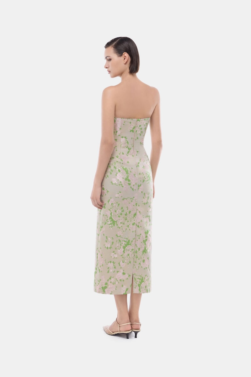 Montsand pastel floral corsetry tube dress displayed on a model, featuring a fitted gown with a pastel floral pattern.