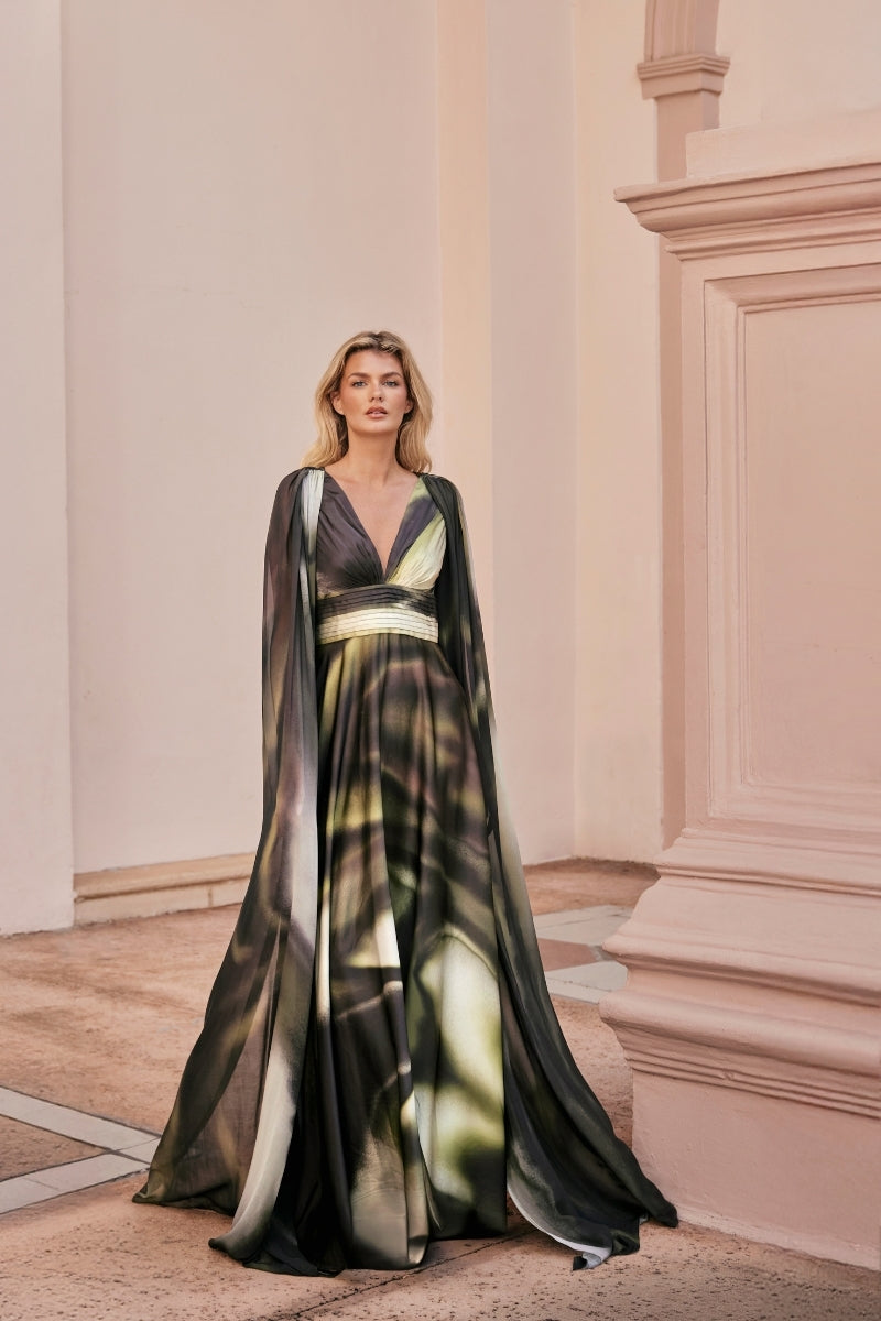 Green print Dalia Maxi Dress by Tinta Latina featuring a flowing silhouette and vibrant floral pattern.