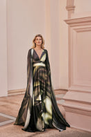 Green print Dalia Maxi Dress by Tinta Latina featuring a flowing silhouette and vibrant floral pattern.