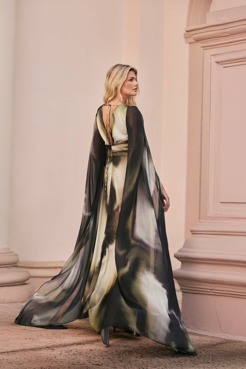 Green print Dalia Maxi Dress by Tinta Latina featuring a flowing silhouette and vibrant tropical floral pattern.