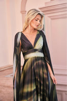 Green print Dalia maxi dress by Tinta Latina featuring flowy fabric and elegant design, perfect for summer outings.