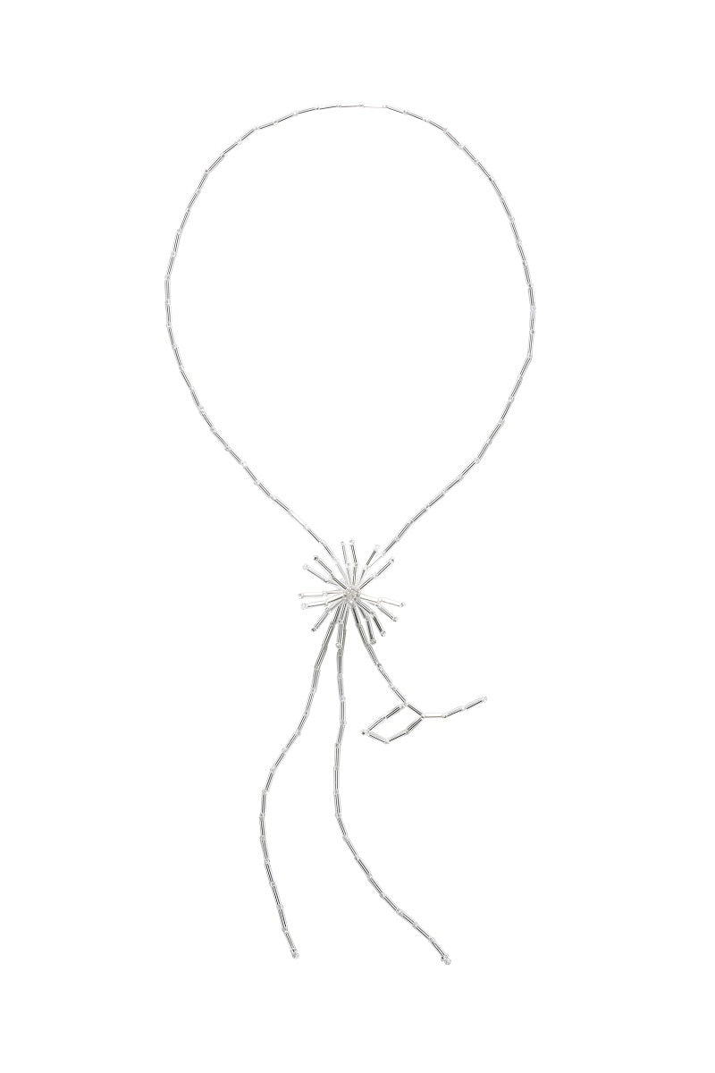 Silver dandelion tie bolo necklace by Pura Utz, featuring a delicate dandelion charm on a sleek silver chain.