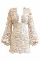 Andrea Iyamah Dani mini lace dress in ivory, showcasing delicate lace fabric, fitted silhouette, and stylish mini length.