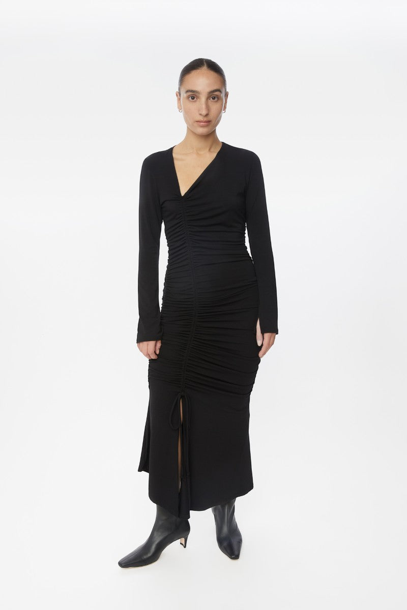 Dāl the Label modal ruched asymmetric midi dress in a stylish design, featuring ruching and an asymmetrical hem.