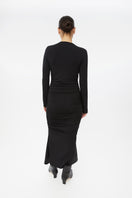 Dāl the Label modal ruched asymmetric midi dress displayed on a model, showcasing its elegant design and draped fabric.