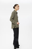 Relaxed long cuff top by Dāl the Label, shown in a stylish shirt design with long sleeves and a comfortable fit.