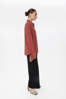 Relaxed fit long cuff shirt by Dāl the Label, featuring a soft fabric and casual style, shown in a fashion lookbook image.