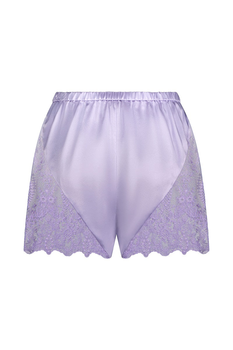 Scarlett Gasque Delilah Shorts in denim, featuring a high-waist design and classic five-pocket styling, displayed on a hanger.