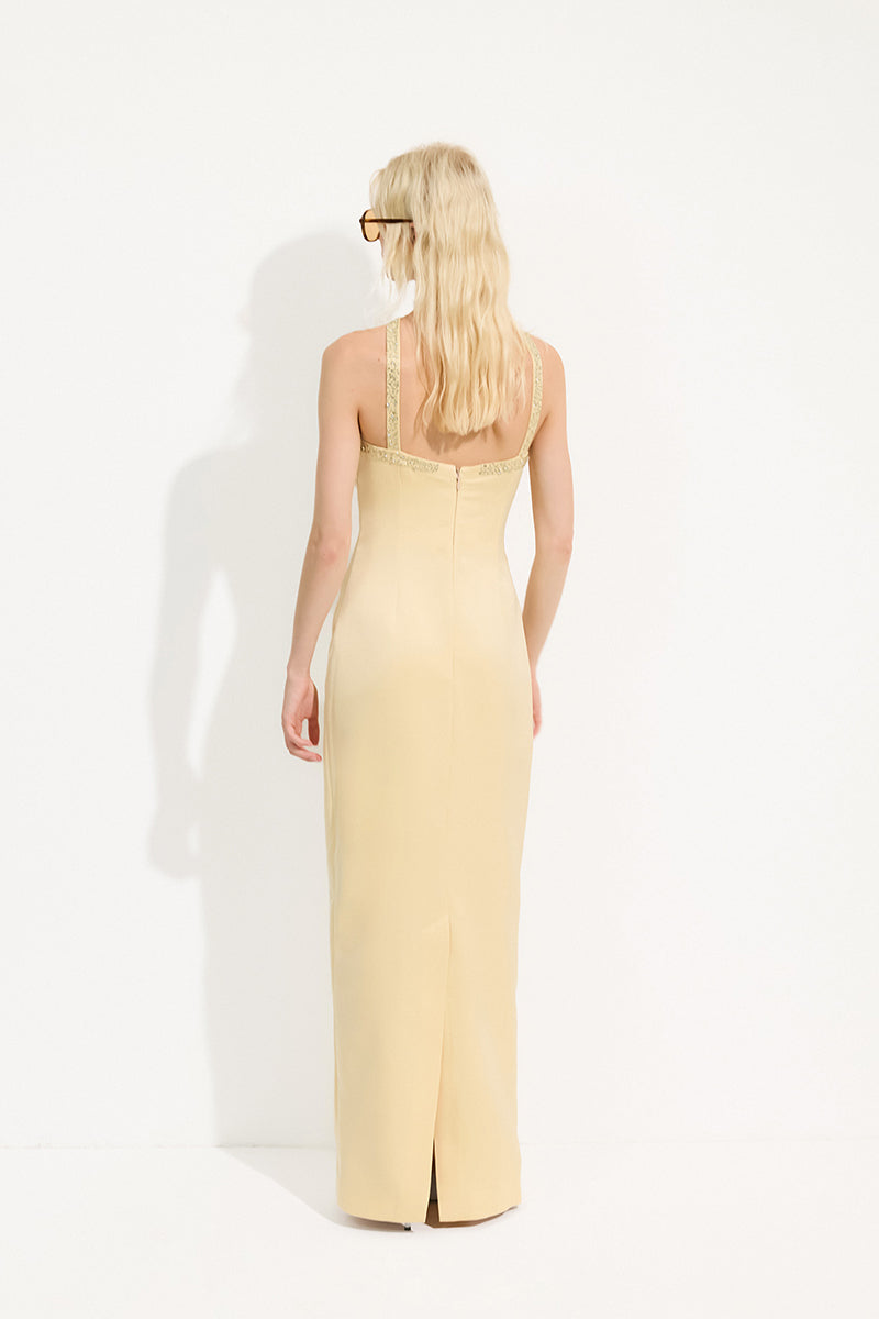 Urban Muse Delphine Gown in Butter, a flowing maxi dress with elegant design and soft fabric, perfect for formal occasions.