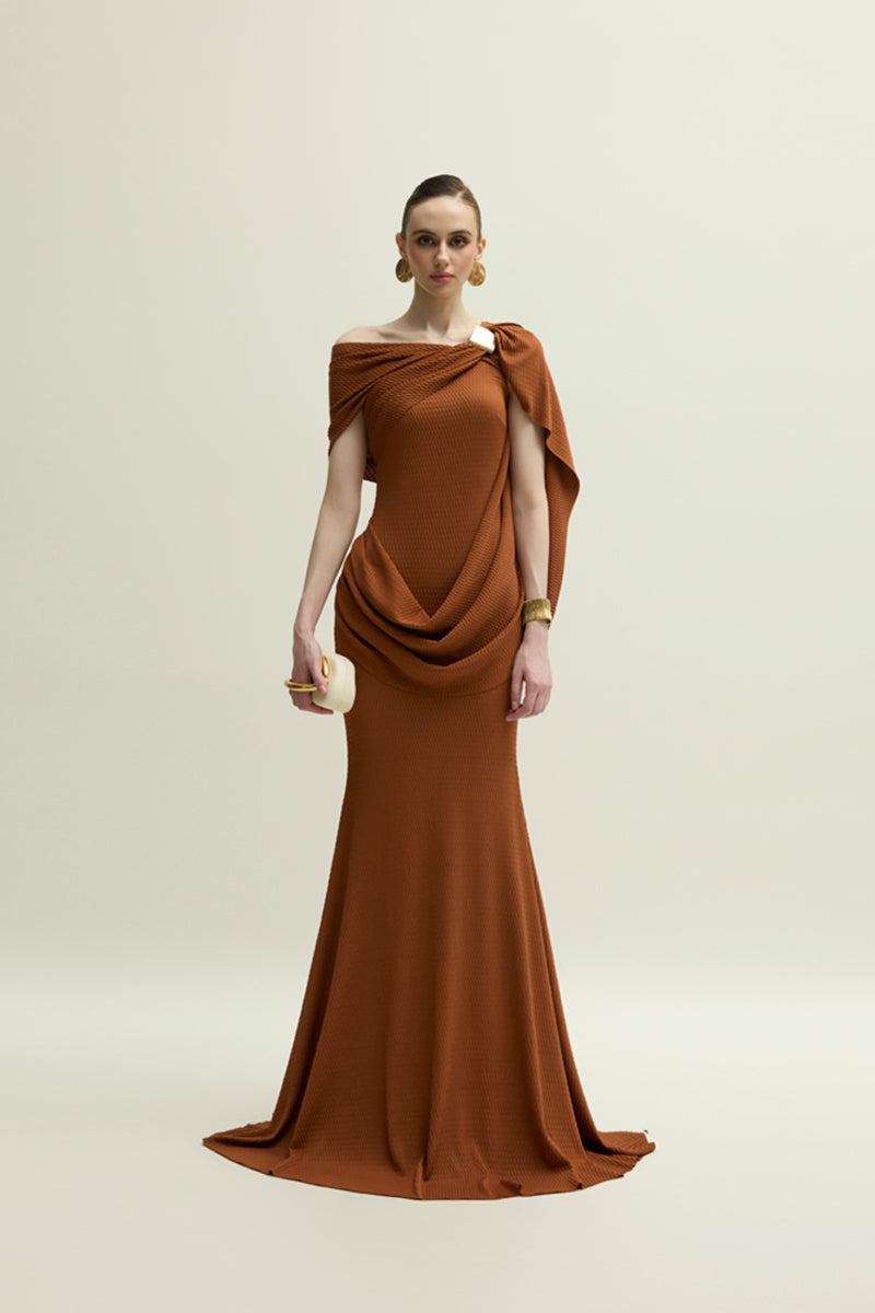 Jenny K Tran Devon gown in burnt orange, elegant evening dress with flowing fabric and stylish design.