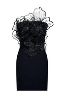 Black DION dress by Gigii's mini dress collection, featuring a stylish and fitted design with elegant details.