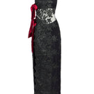 Elegant VITA GOWN by Somebodée, flowing fabric and intricate details, showcased on a model in a stylish fashion setting.
