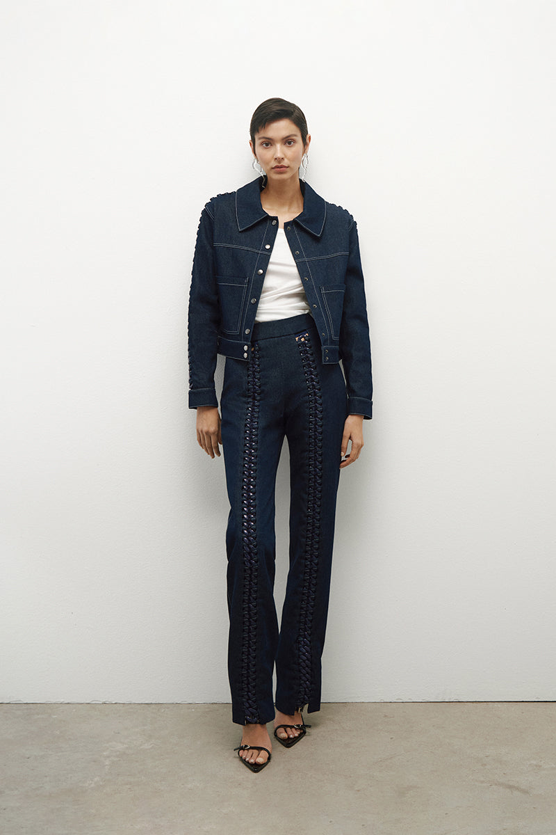 JC Pajares denim jeans with chain details on the legs, featuring a classic fit and stylish hardware accents.