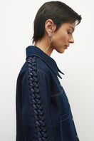JC Pajares denim jacket with chain details on the sleeves, stylish casual outerwear featuring metal chain accents.