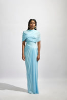 Deme By Gabriella Jasmine Baby Blue Maxi Dress displayed on a hanger, flowing fabric with delicate details, perfect for elegant occasions.
