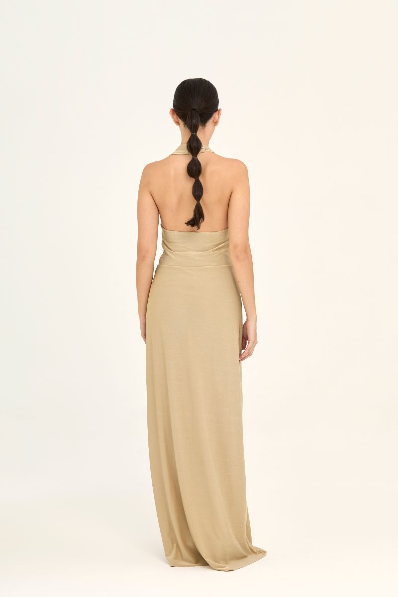 Aguaclara Doree maxi dress in flowing fabric with a floral pattern, styled for summer or casual occasions.