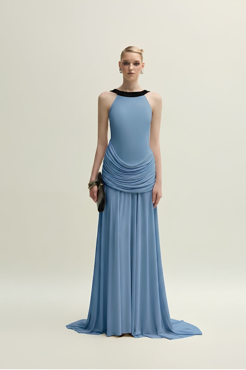 Blue Dorset gown by Jenny K Tran featuring elegant fabric and a flowing silhouette, perfect for formal occasions.
