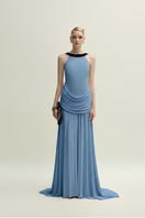 Blue Dorset gown by Jenny K Tran featuring elegant fabric and a flowing silhouette, perfect for formal occasions.