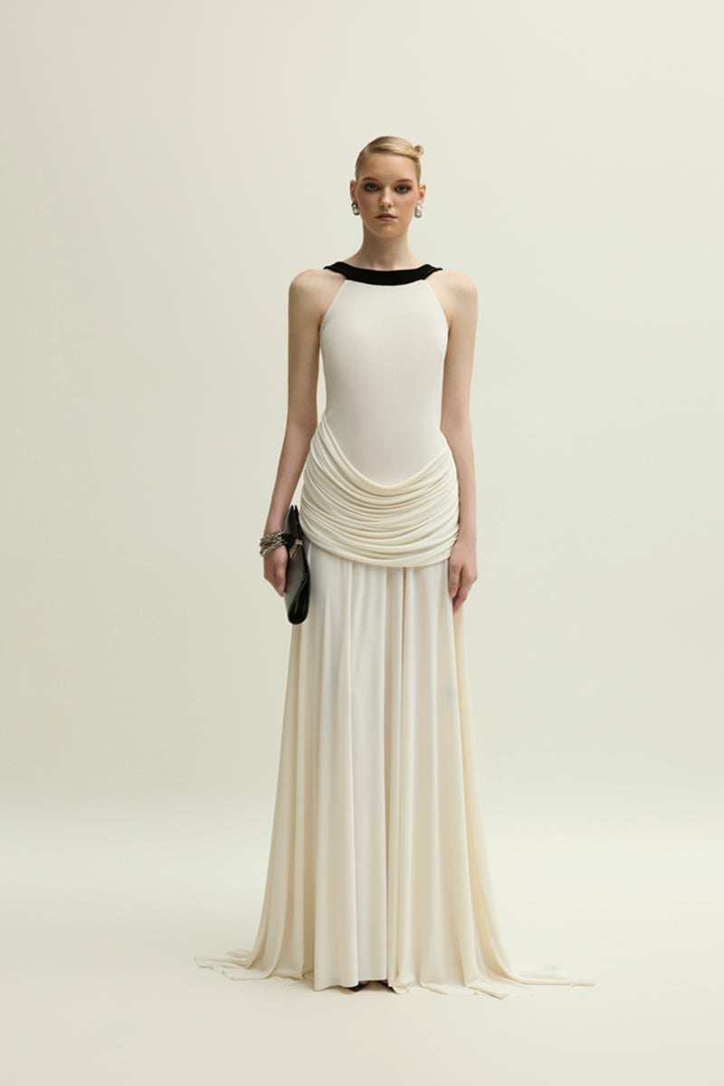 Elegant ivory Dorset gown by Jenny K Tran featuring flowing fabric and detailed design, perfect for formal occasions.