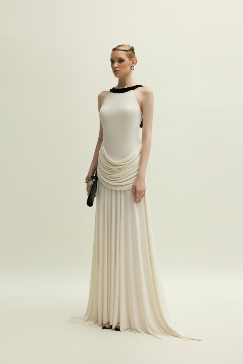 Jenny K Tran Dorset Ivory gown showing elegant design and flowing fabric, perfect for formal occasions.