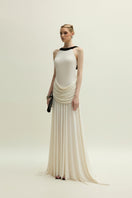 Jenny K Tran Dorset Ivory gown showing elegant design and flowing fabric, perfect for formal occasions.