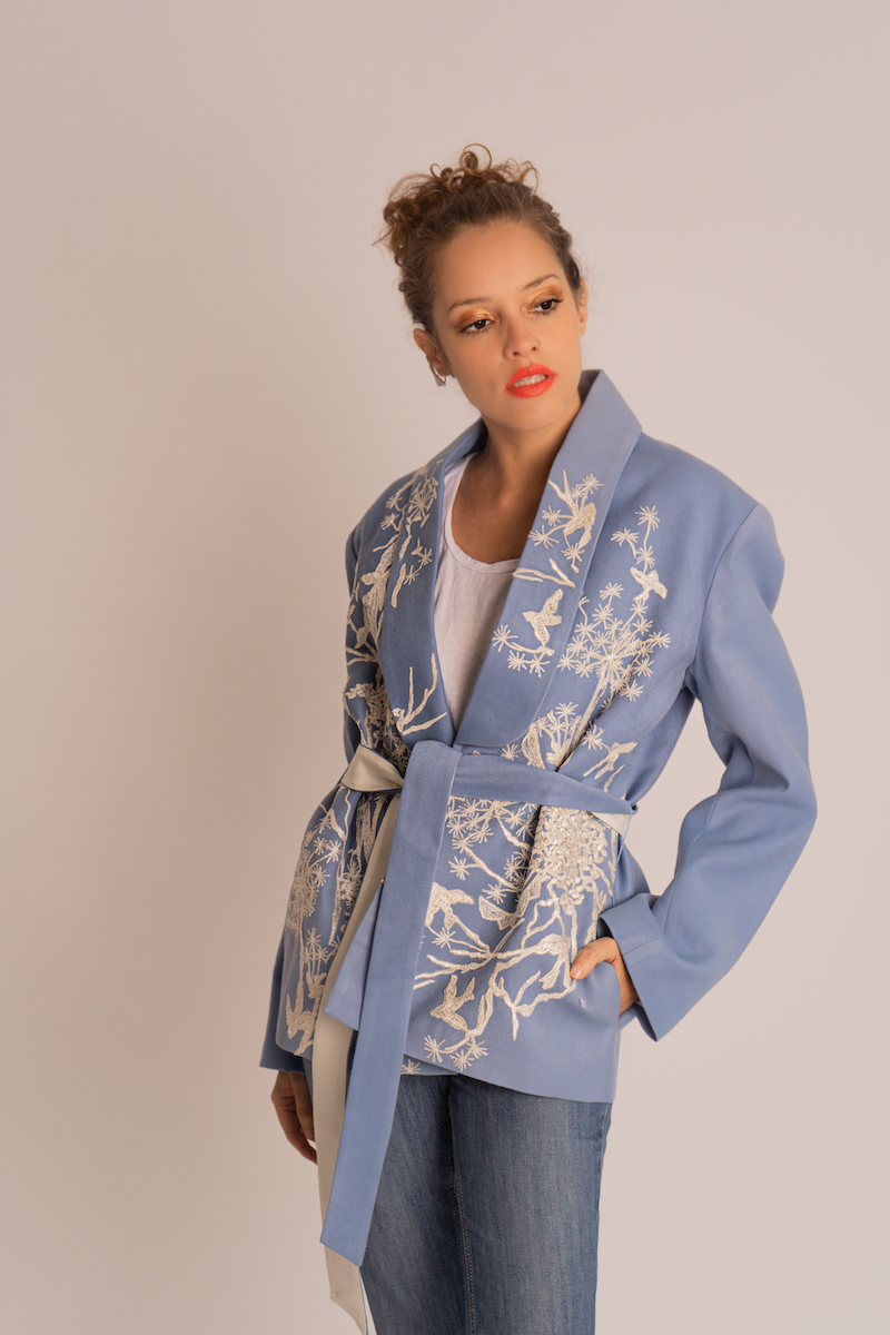Nadya Shah Nyla powder blue belted jacket with long sleeves and front pockets, stylish and lightweight for casual wear.