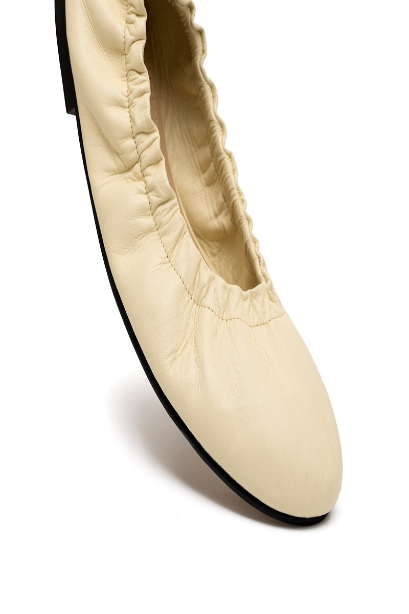 ALTA Connie Butter Flats, stylish women’s flat shoes in butter-colored leather, with a sleek, minimal design.