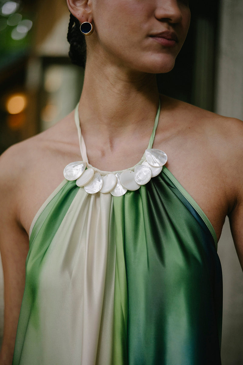 Maylé Vásquez CANTO Maxi Dress featuring flowy fabric and stylish design, perfect for elegant summer occasions.
