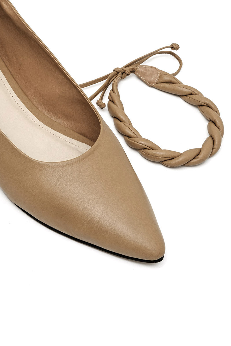Alta Aria almond flats, stylish women's slip-on shoes with almond-shaped toes, in a neutral beige color.