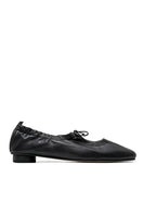 Black ALTA GEMMA flats with pointed toes and sleek design, shown on a white background.