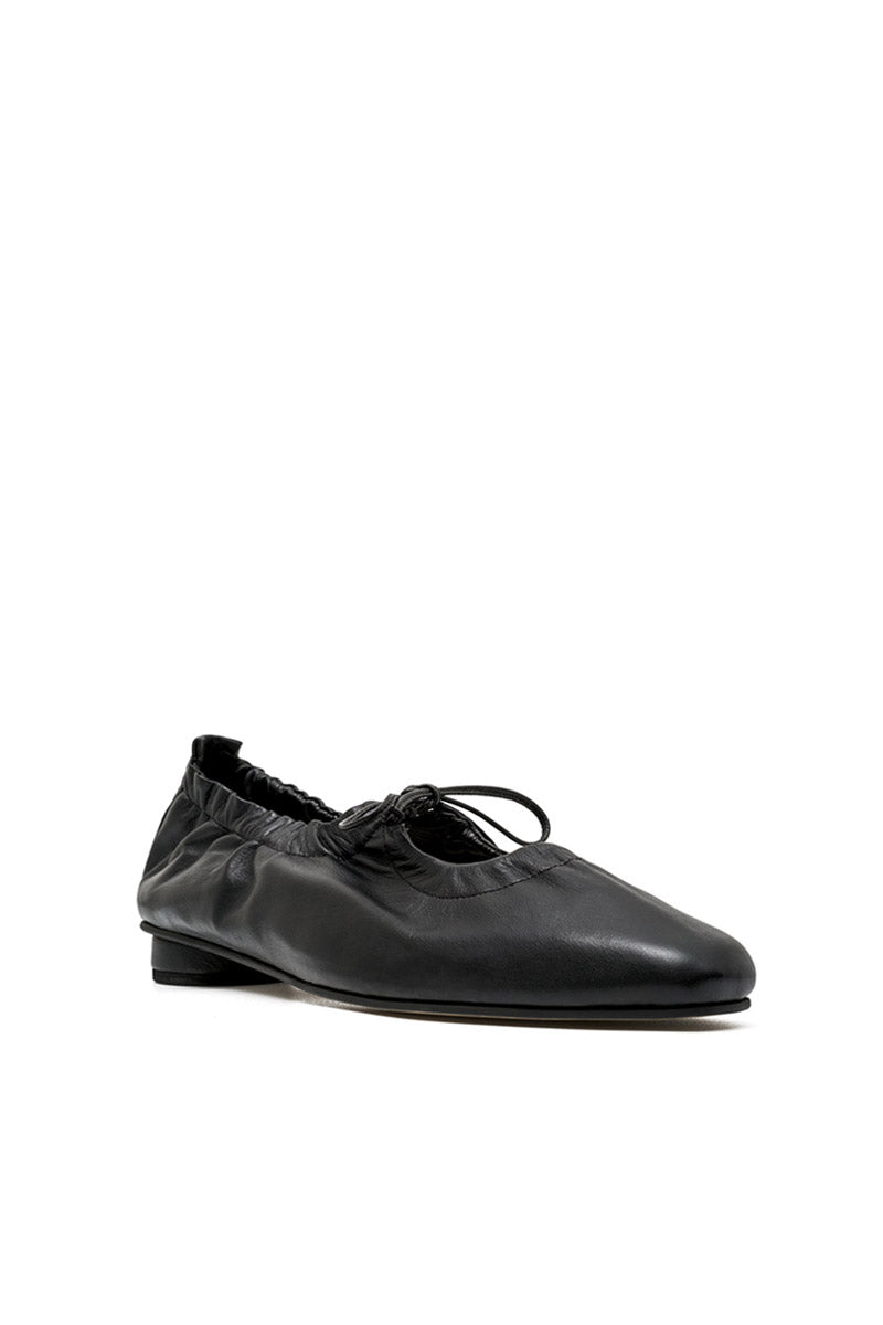 Black ALTA GEMMA flats with pointed toes and sleek design, shown on a white background.