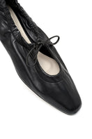 Black ALTA GEMMA flats with sleek design, featuring a comfortable slip-on style and minimalistic look, perfect for everyday wear.