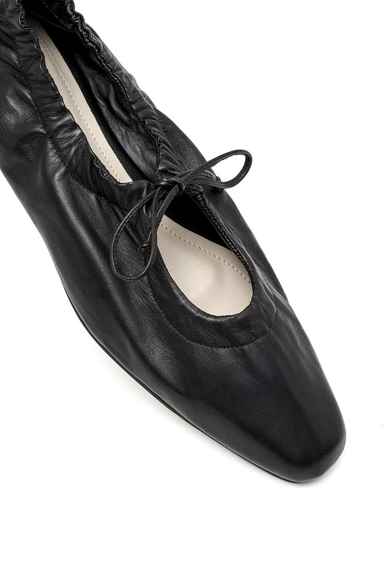 Black ALTA GEMMA flats with sleek design, featuring a comfortable slip-on style and minimalistic look, perfect for everyday wear.