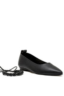 Black flats from ALTA's ARIA collection, showcasing sleek, comfortable slip-on footwear with a smooth finish and minimal design.