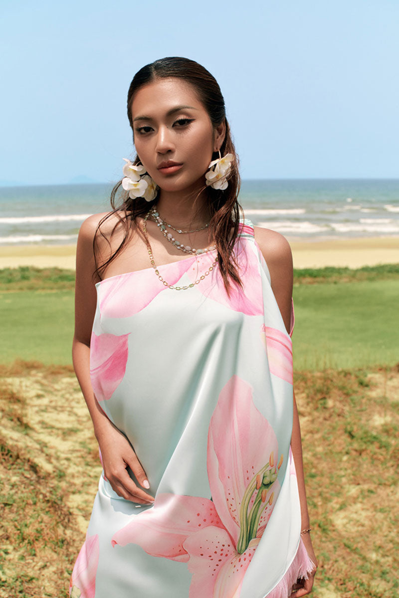 Valenciani multicolor one-shoulder maxi dress with flowing fabric and vibrant pattern, perfect for elegant summer occasions.