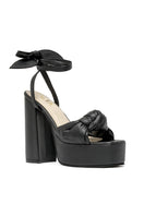 Black ALTA Emilia sandals with open toe and ankle strap, featuring a stylish design and comfortable flat sole.