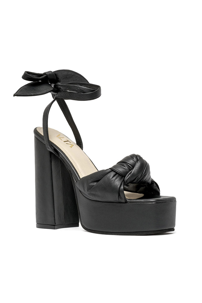 Black ALTA Emilia sandals with open toe and ankle strap, featuring a stylish design and comfortable flat sole.
