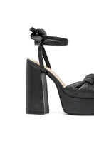 Black ALTA Emilia sandals with open toes and ankle straps, displayed on a neutral background.