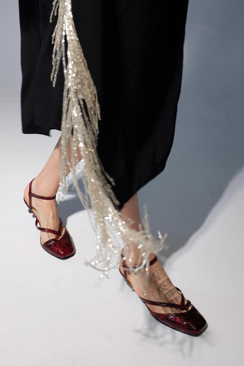 Gvasalia dark cherry embossed slingback heels with pointed toe and slim heel, stylish women’s footwear in close-up view.