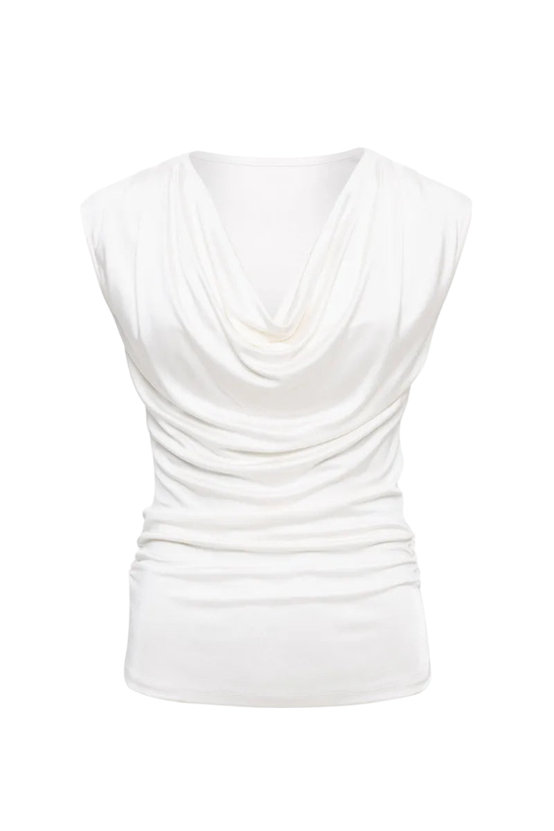 Sélone Ylune Liquid Drape Top in soft ivory, featuring flowing fabric and elegant drape design, worn as stylish women's top.