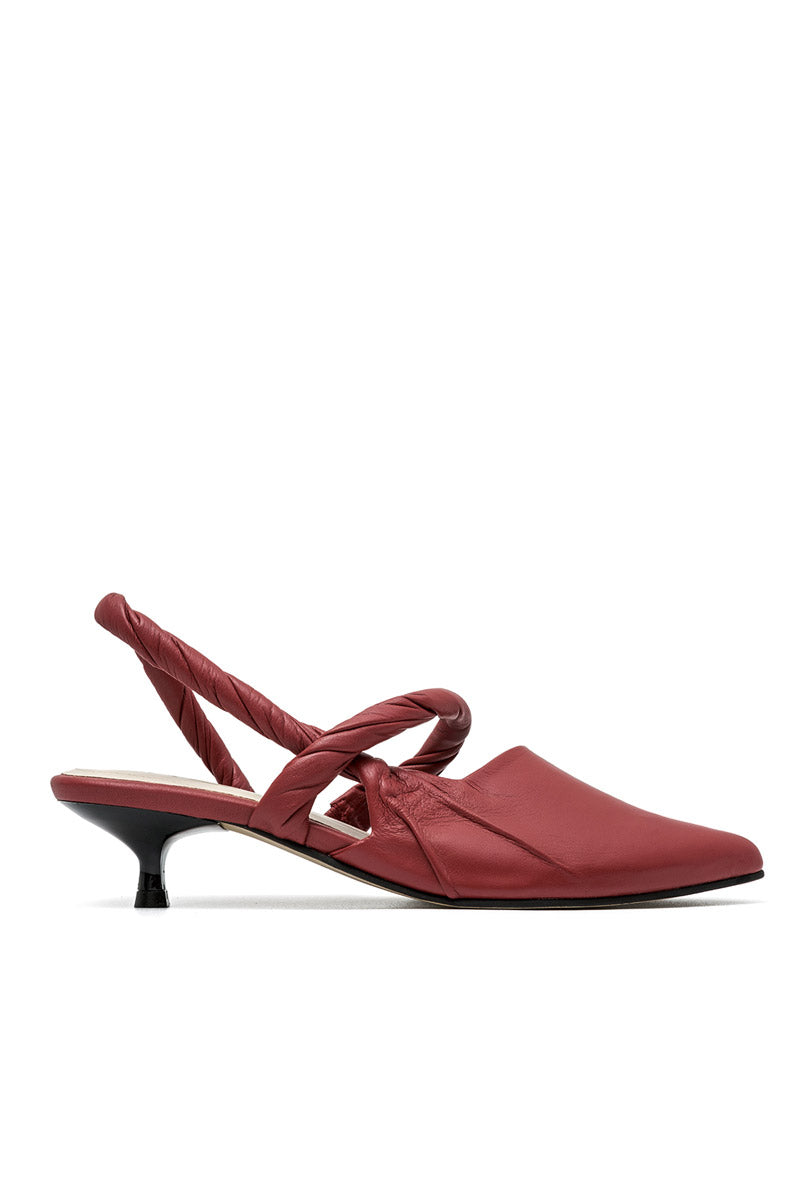 Elegant red high heels from ALTA's Ginevra collection, showcasing sleek design and stylish craftsmanship.