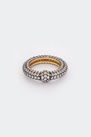 Poché Crystal Flow Ring featuring a sparkling crystal gemstone set in a sleek silver band.