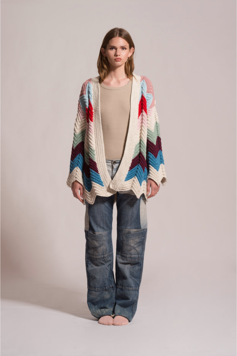 First Born Knits Ziggy knitted cardigan, cozy long-sleeve sweater with textured knit pattern, in a neutral color.