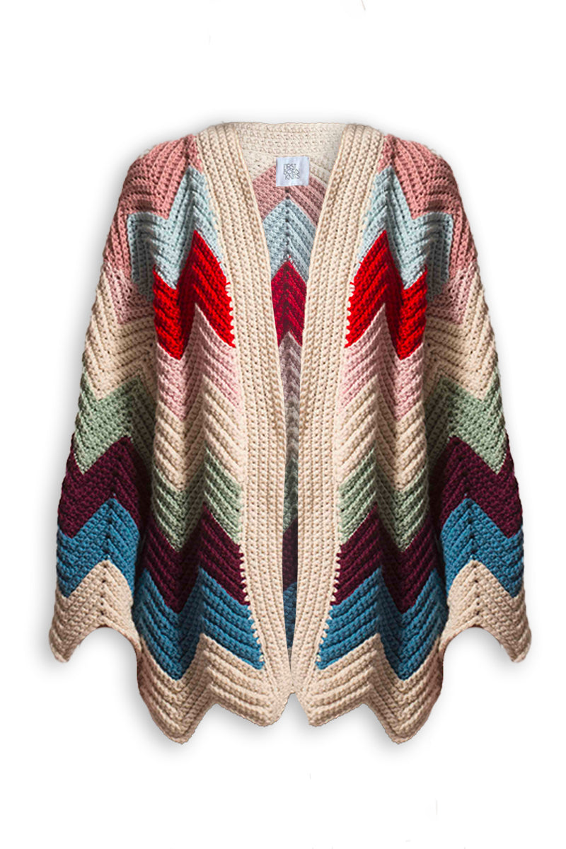 First Born Knits Ziggy knitted cardigan displayed in a cozy, textured design with a button-up front and soft yarn fabric.
