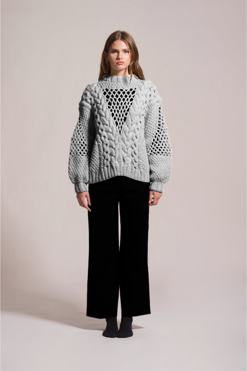 First Born Knits Dafne knitted sweater in soft yarn, featuring a cozy, textured design and a relaxed fit.