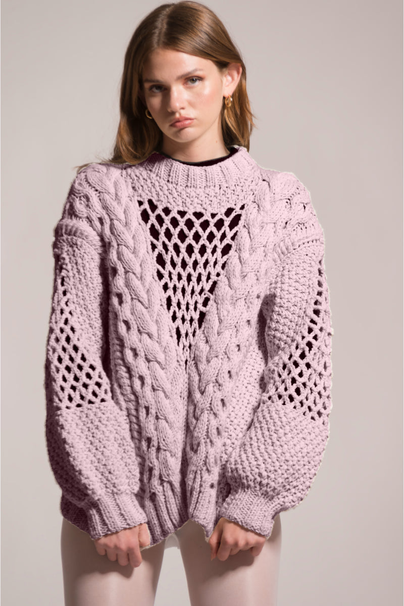 First Born Knits DAFNE knitted sweater in cozy, textured fabric, shown in a close-up of the stylish, comfortable sweater.